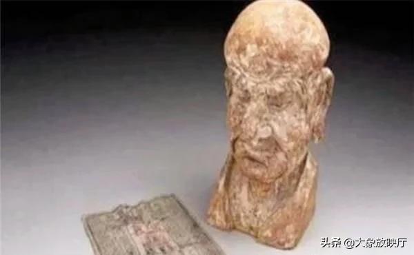 此人将私房钱嵌在人头木雕里，藏了600余年，两任收藏家都没发现
