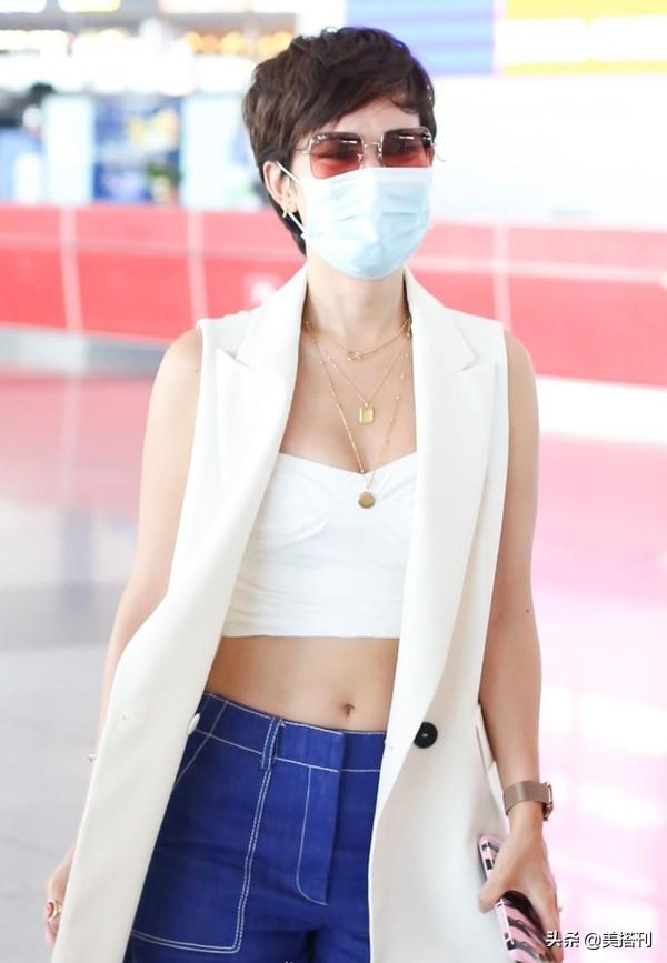 卢靖姗越来越庚化！剪小男孩头穿露脐装，隔着