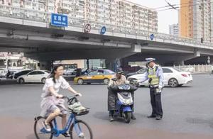 Beijing policeman leaves punish motor-car of repor