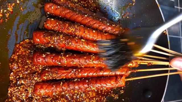 怎么用烤箱烤火腿肠(烧烤火腿肠的做法)