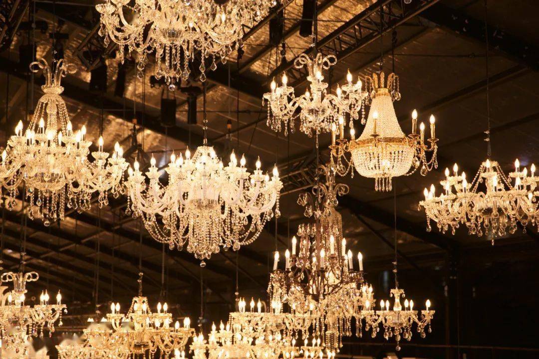 Louis Vuitton Women's Spring-Summer 2022 Show in Shanghai  #LVSS22 The  scene of an opulent ball. Illuminated by over 1000 hanging chandeliers, Louis  Vuitton travels to the Shipyard Repair Docks on the