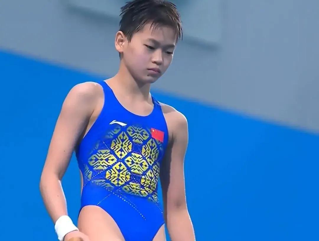 全红婵有麻烦了！何教练最担心的事情，被强行合影，幸好有谢思埸