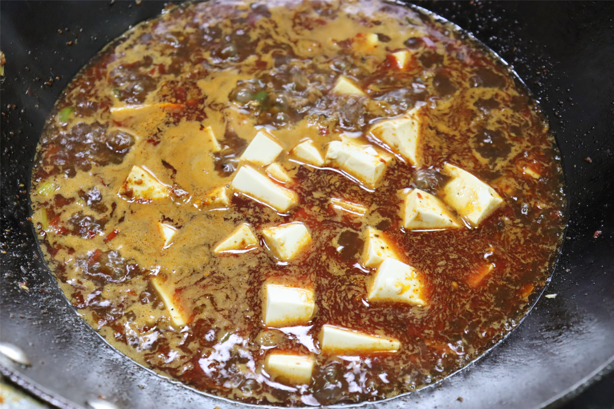 Eating tofu and rice. My family only loves this one. I don’t bother to eat 7 meals a week. The rice has to be steamed in a big pot.