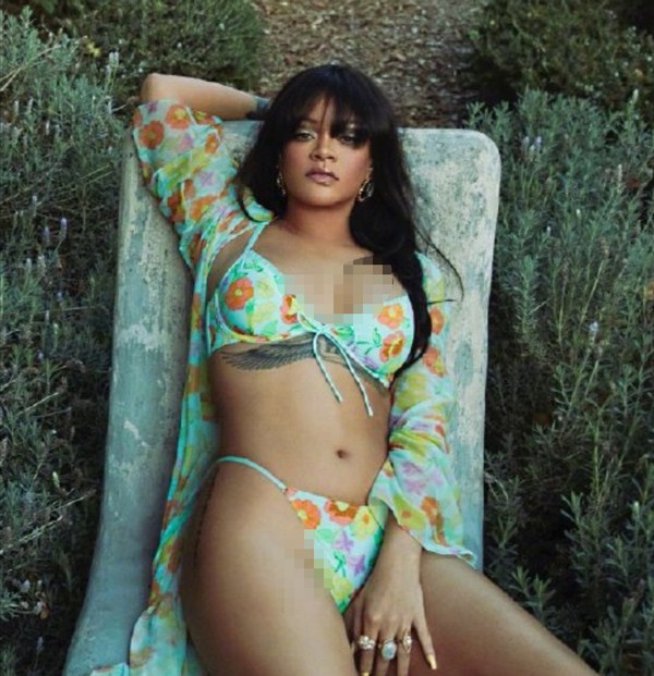 天后蕾哈娜拍写真，动作妩媚戴巨型鸽子蛋，全身多个纹身太抢镜