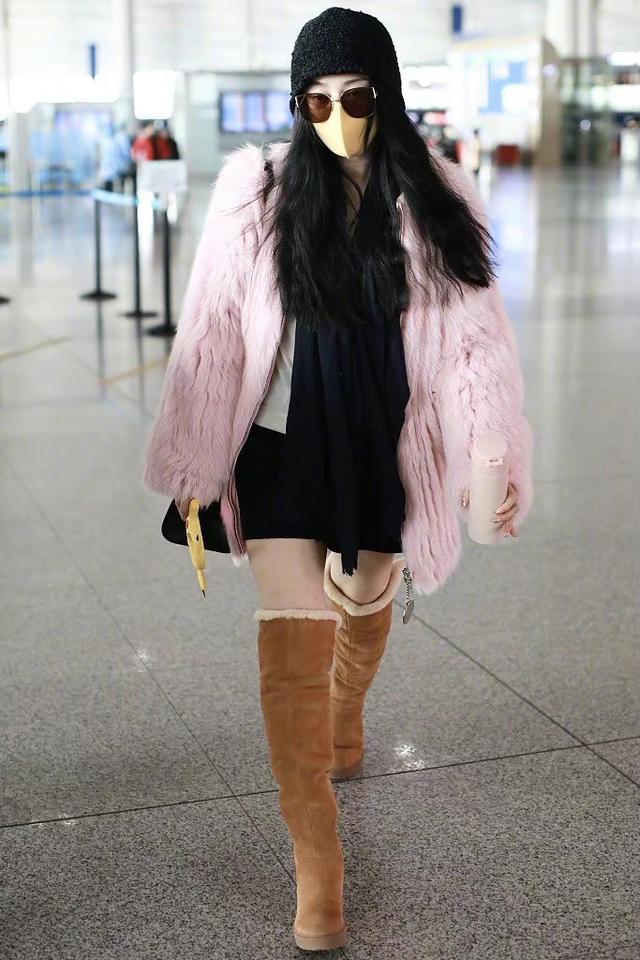 Fan Bingbing's latest airport Reuters, wearing pink fur with snow boots ...