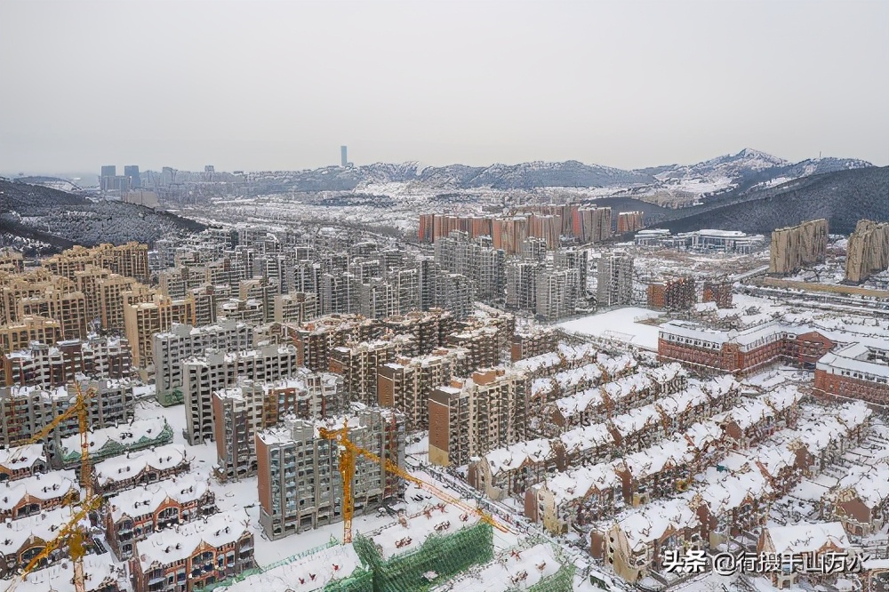 Jinan snowed, boat takes new city of Jinan the eastpart part, take the beautiful scenery after you watch snow