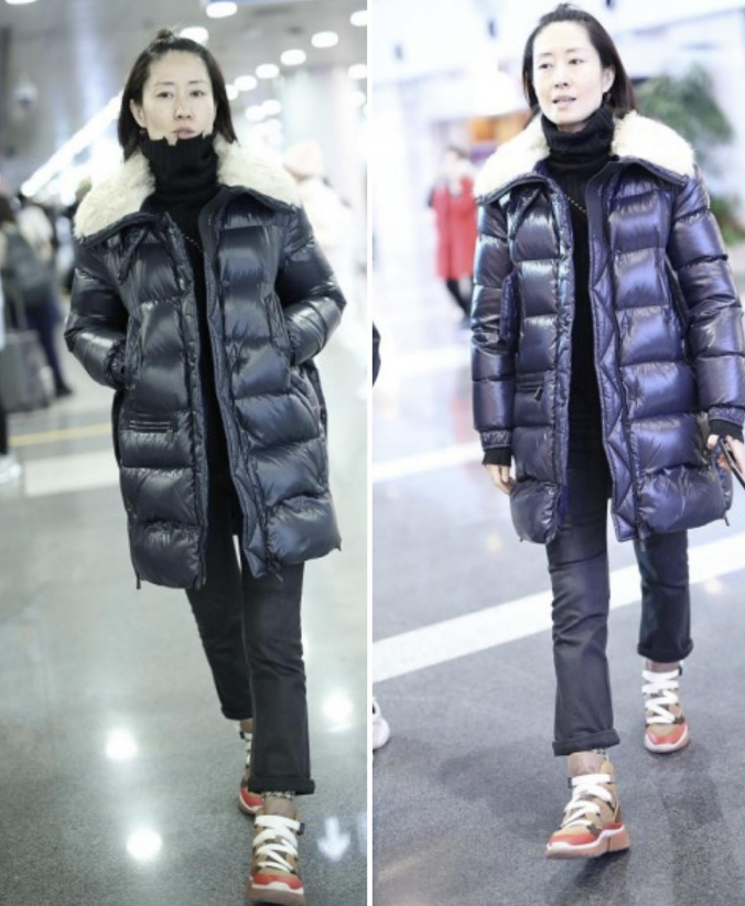 刘敏涛发型有些显头长，素颜现身机场穿羽绒服