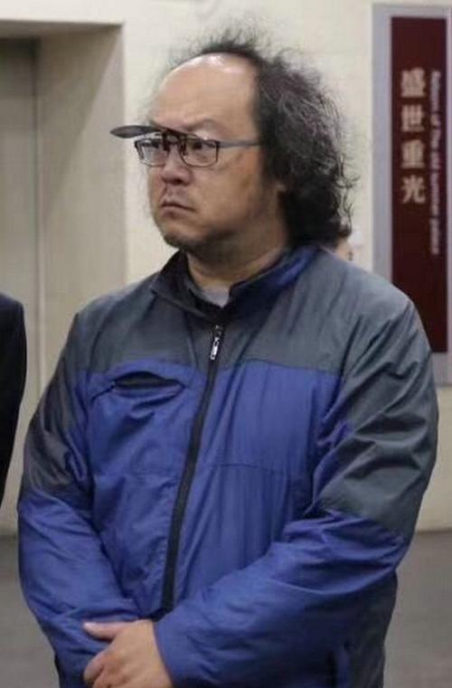 14年前，摇滚天才窦唯，点燃卓伟车后被捕，娶了拉横幅的女粉丝