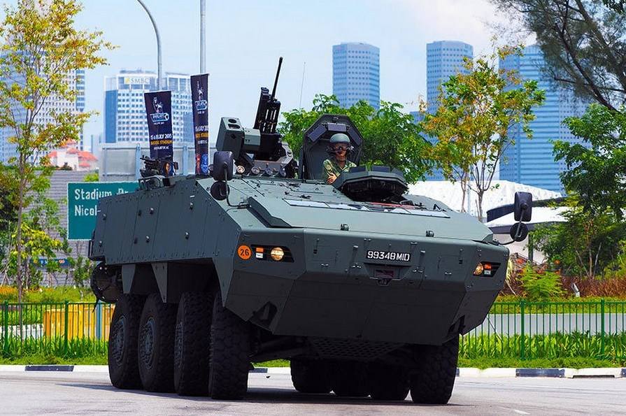 The steel beast in the skyscraper cluster. Singapore Terrex wheeled ...