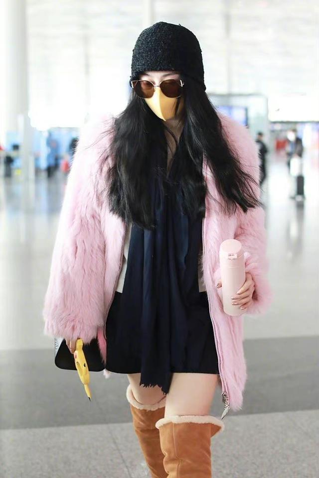 Fan Bingbing's latest airport Reuters, wearing pink fur with snow boots ...