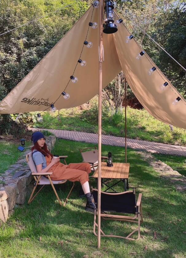 張晉帶兒子玩彩虹滑道，樂兒頭髮被吹成中分，臉嚇得通紅表情淡定