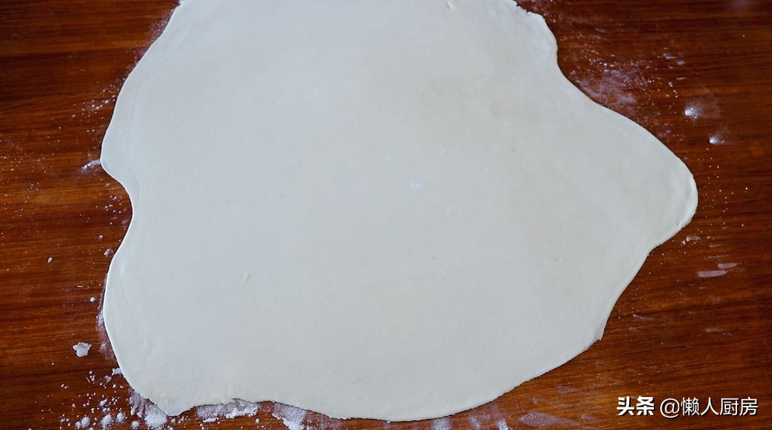 過年做這道小吃，包滿花生餡，寓意錢包滿，是招待客人必備的食品