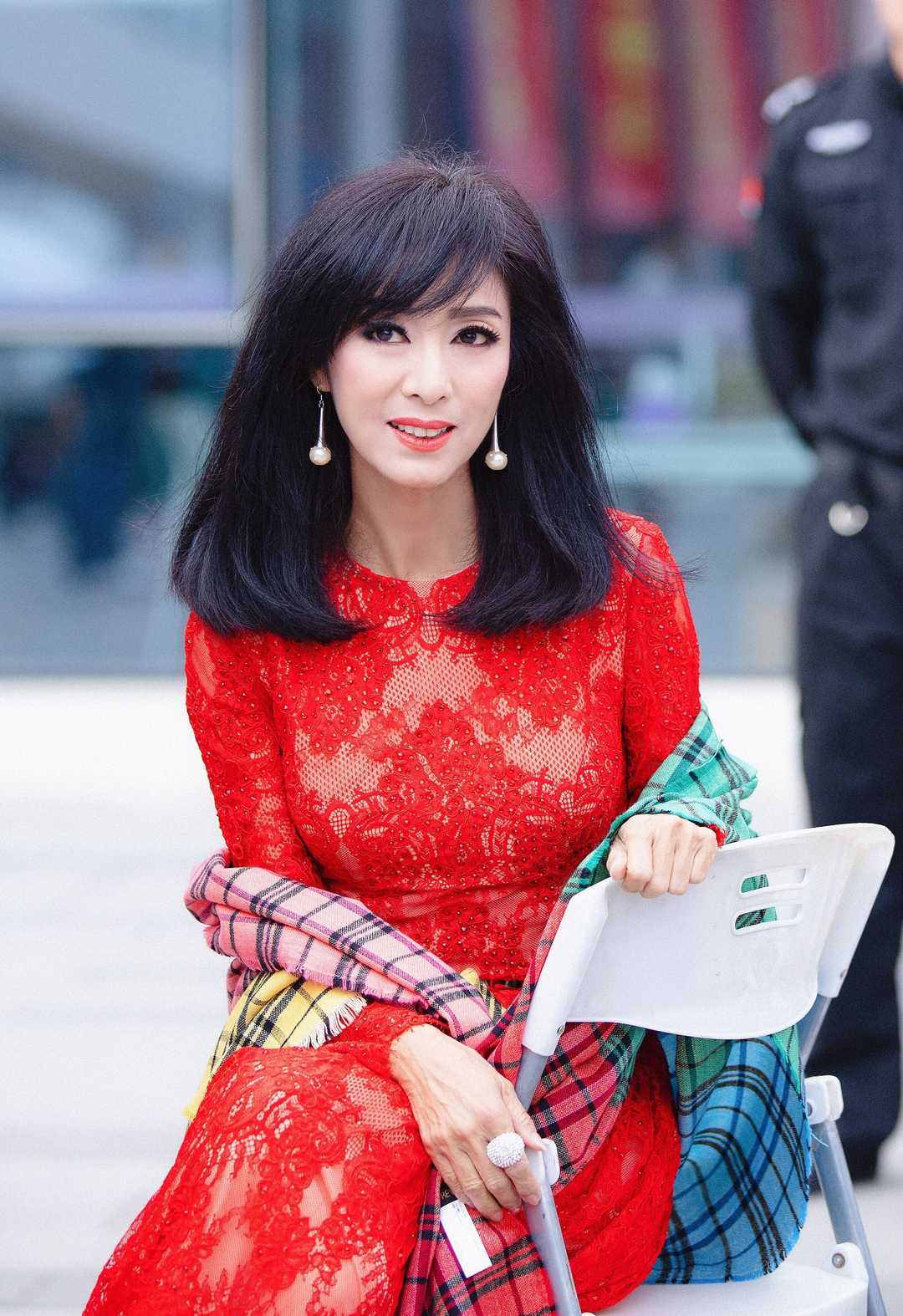 Michelle is so old and beautiful! Wearing a red lace dress, elegant ...