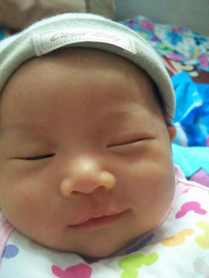 Why do babies always like to "surrender" by raising their hands when