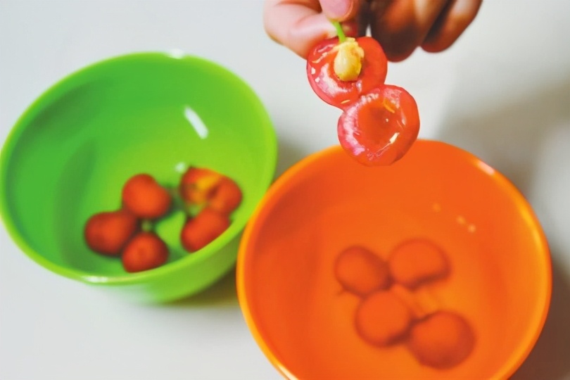 What is the little white worm that is soaked in cherries?Is it harmful