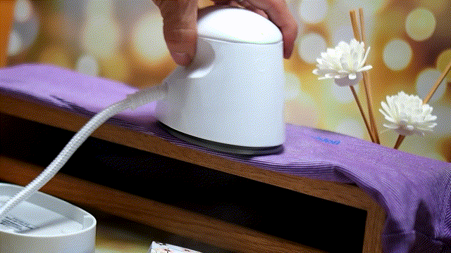 传统熨烫机变身小巧时尚玩物飞乐思纳米蒸汽小熨斗