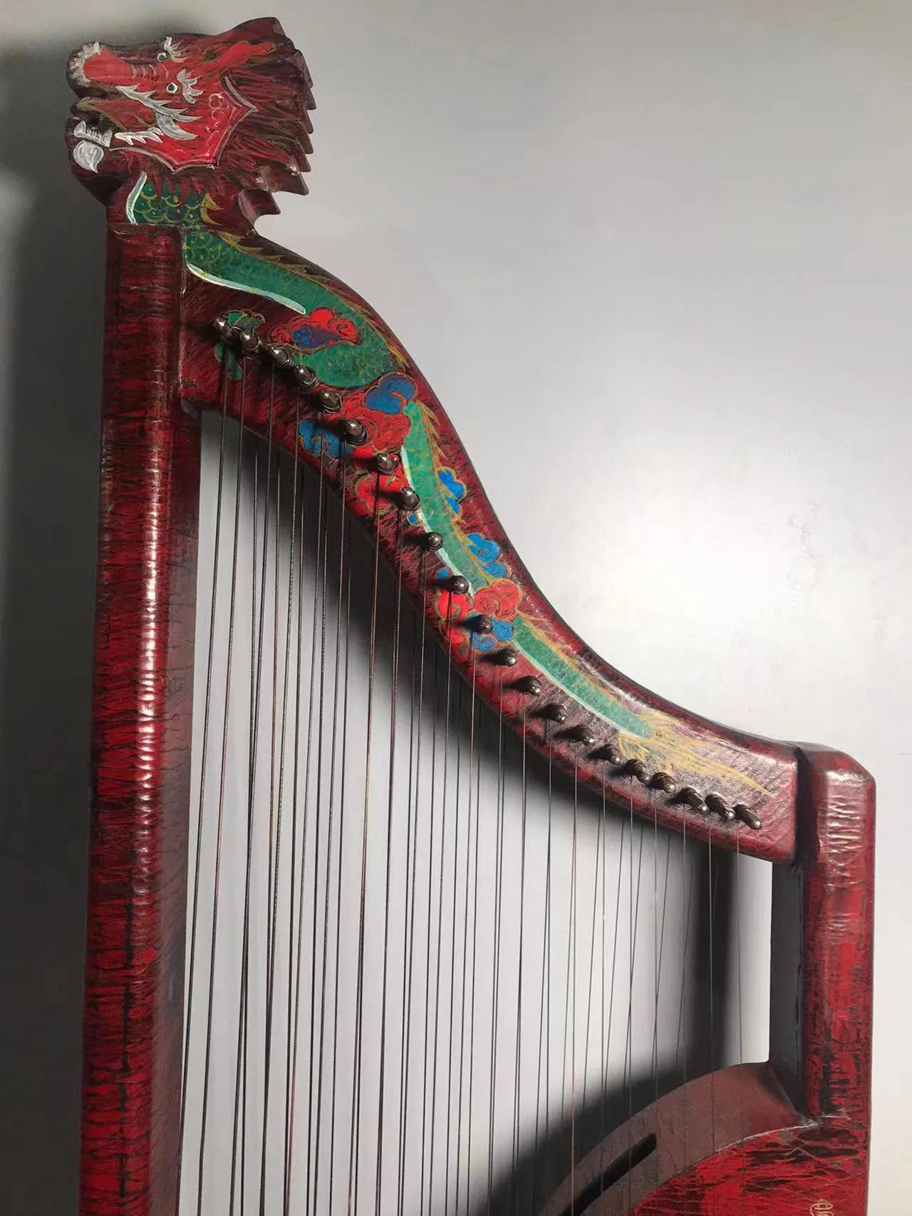 ancient musical instrument painted gold lacquer harp iNEWS