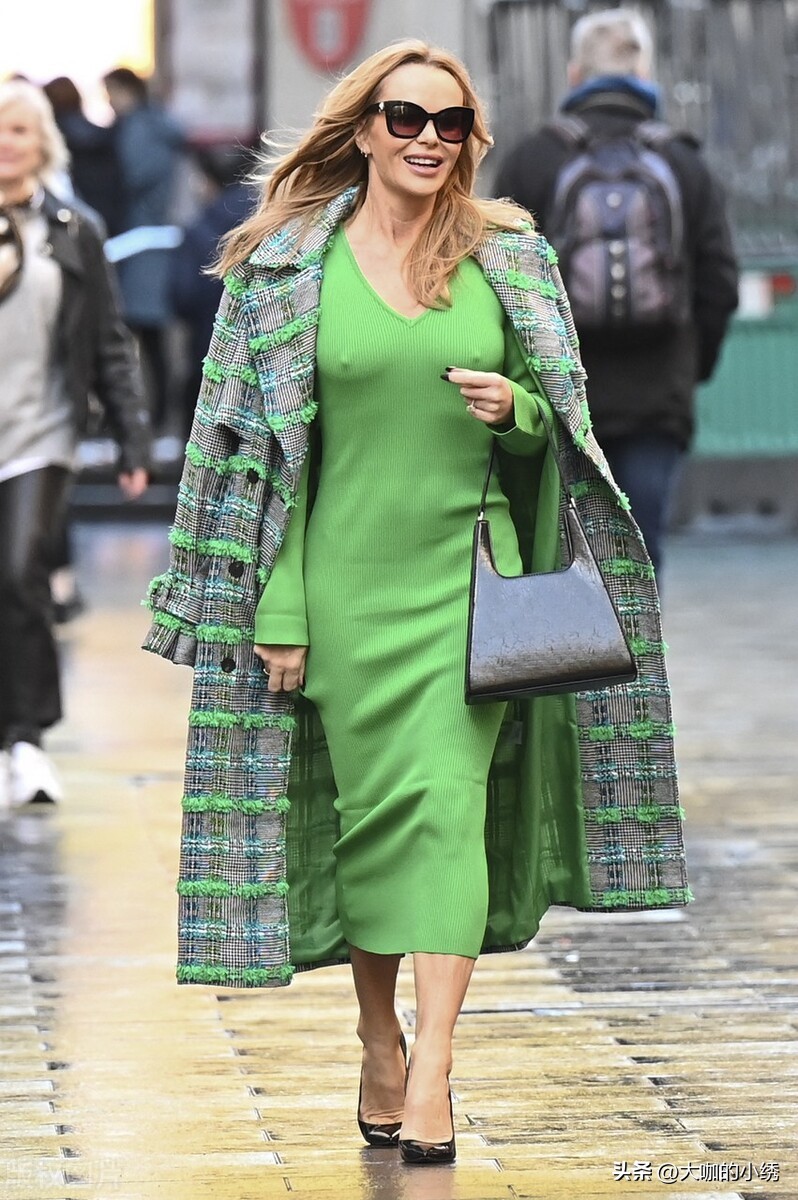 Amanda Holden is wearing a green knitted skirt + plaid coat + high