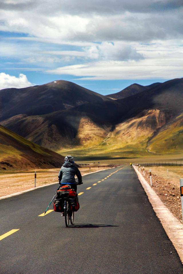 I want to go to Tibet by bicycle. The 318 National Road on the Sichuan ...