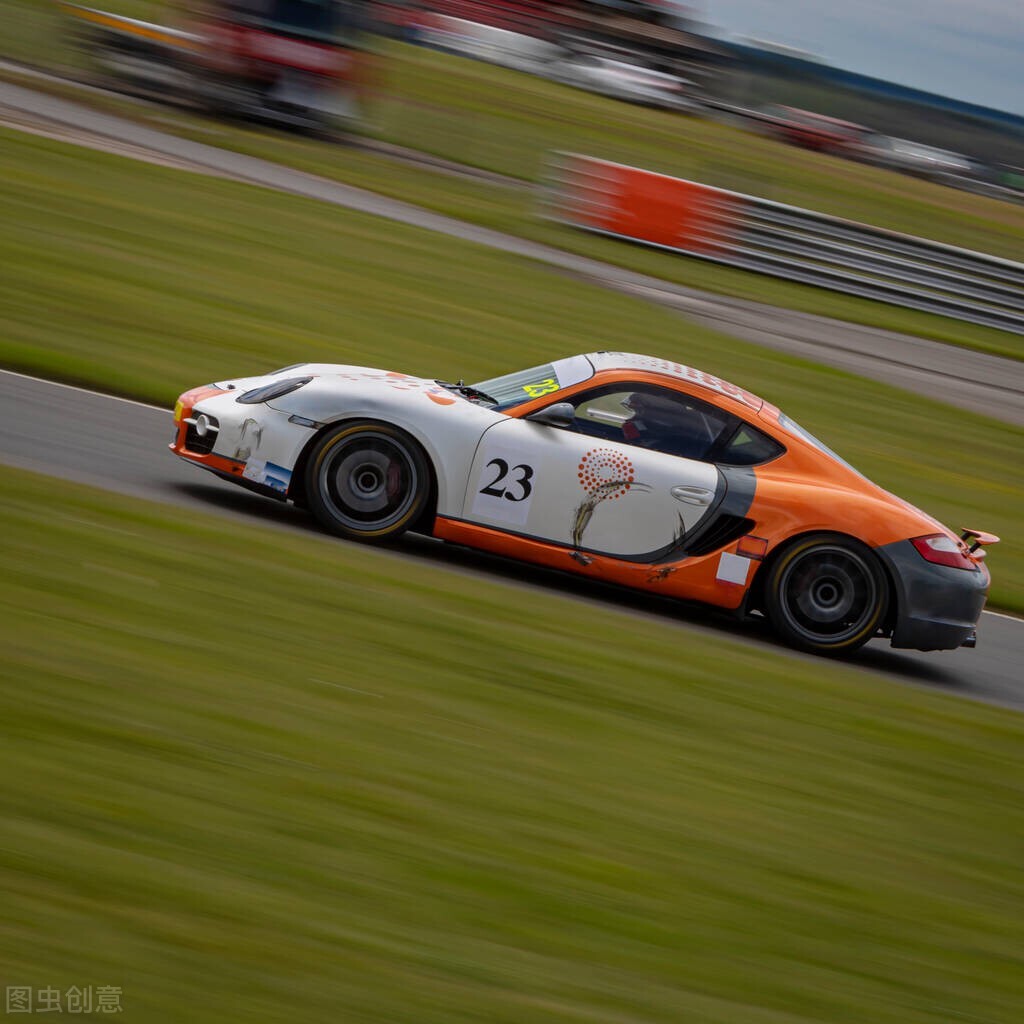 What is the purpose of the rear wing on the racing car? iNEWS