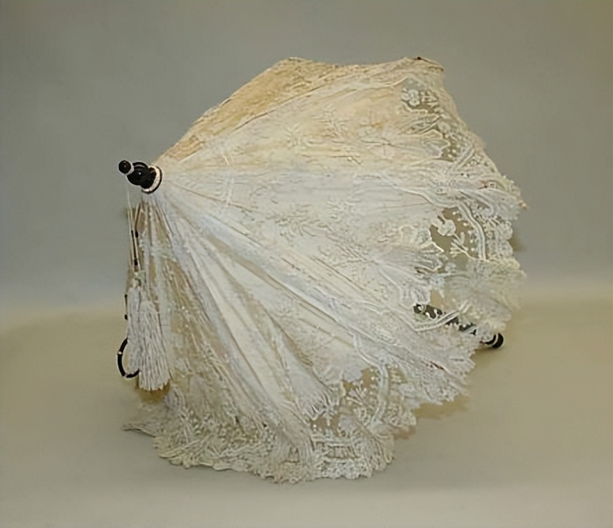 Explore the use and symbolic meaning of umbrellas in the European