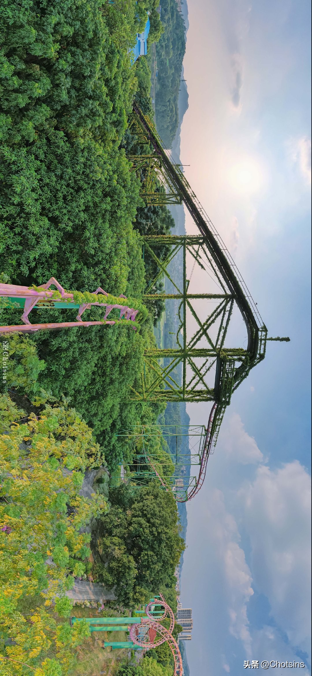 Abandoned roller coaster covered with climbing vines iNEWS