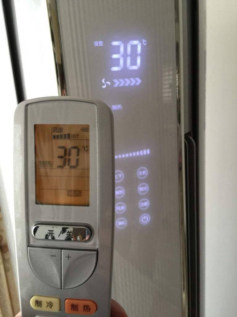 What is the use of the electric auxiliary heat on the air conditioner
