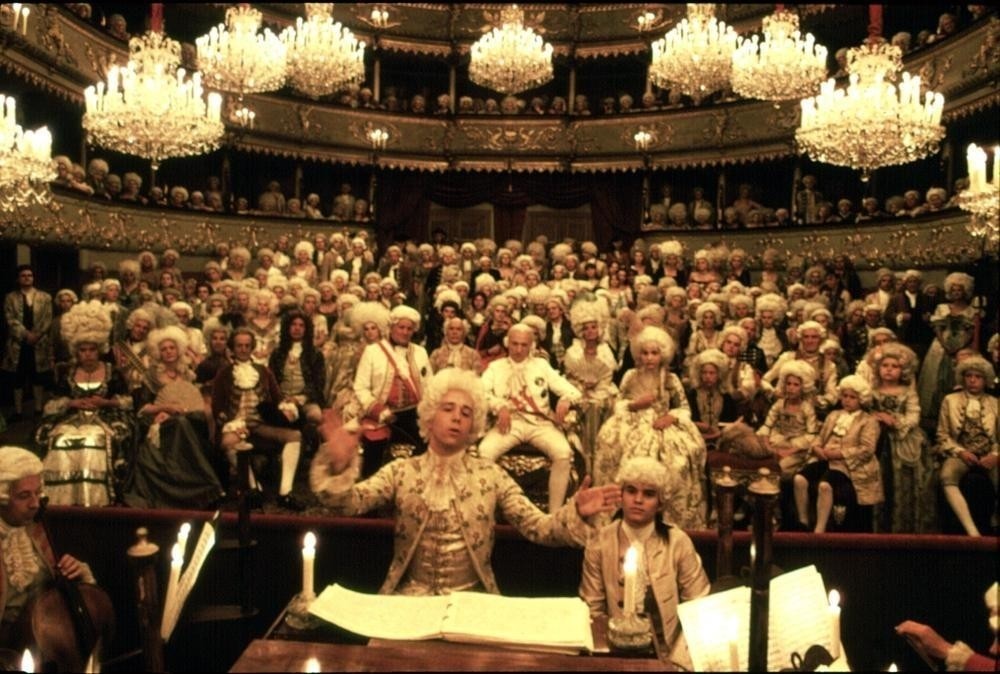 Tom Huesker interprets Mozart's life, blooming the flower of life from