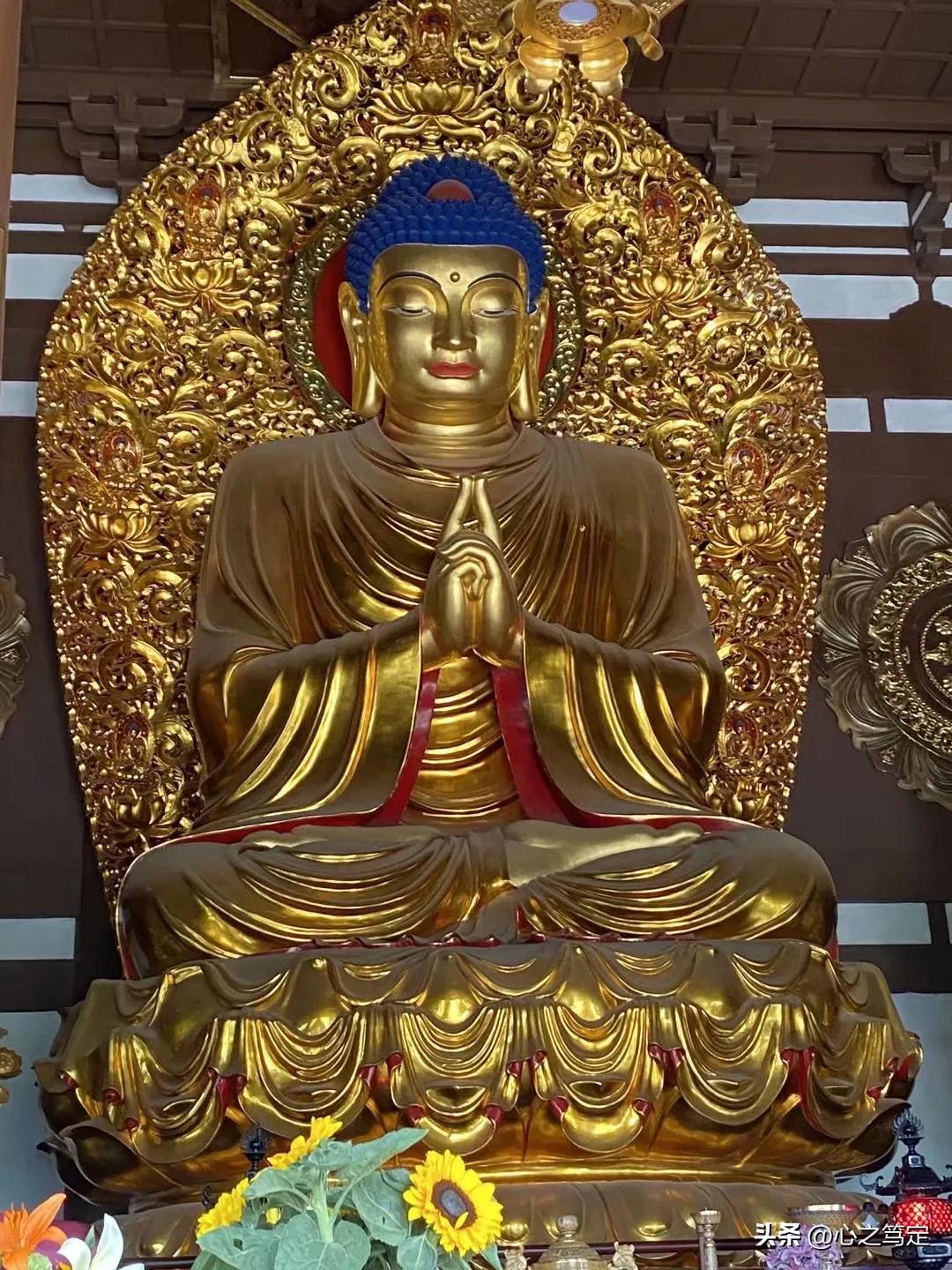 Buddha statues of different shapes in the Mahavira Hall of Longfu ...