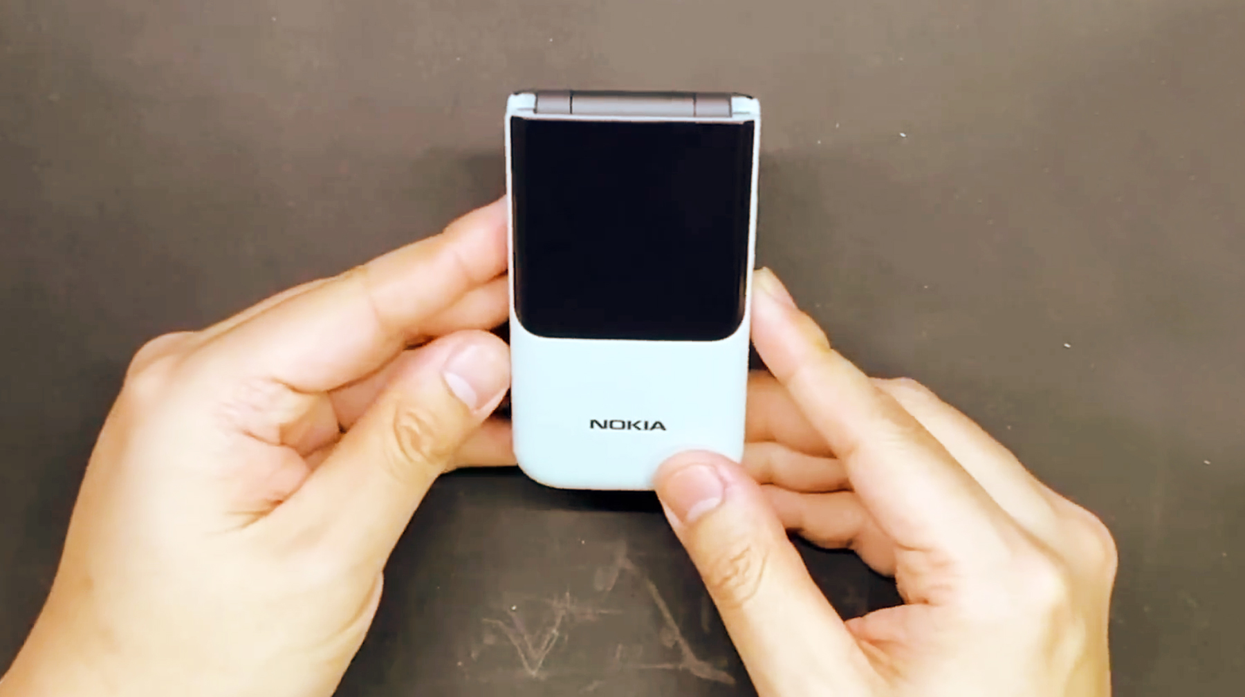 The feeling of smashing walnuts is back. Experience Nokia's flip phone