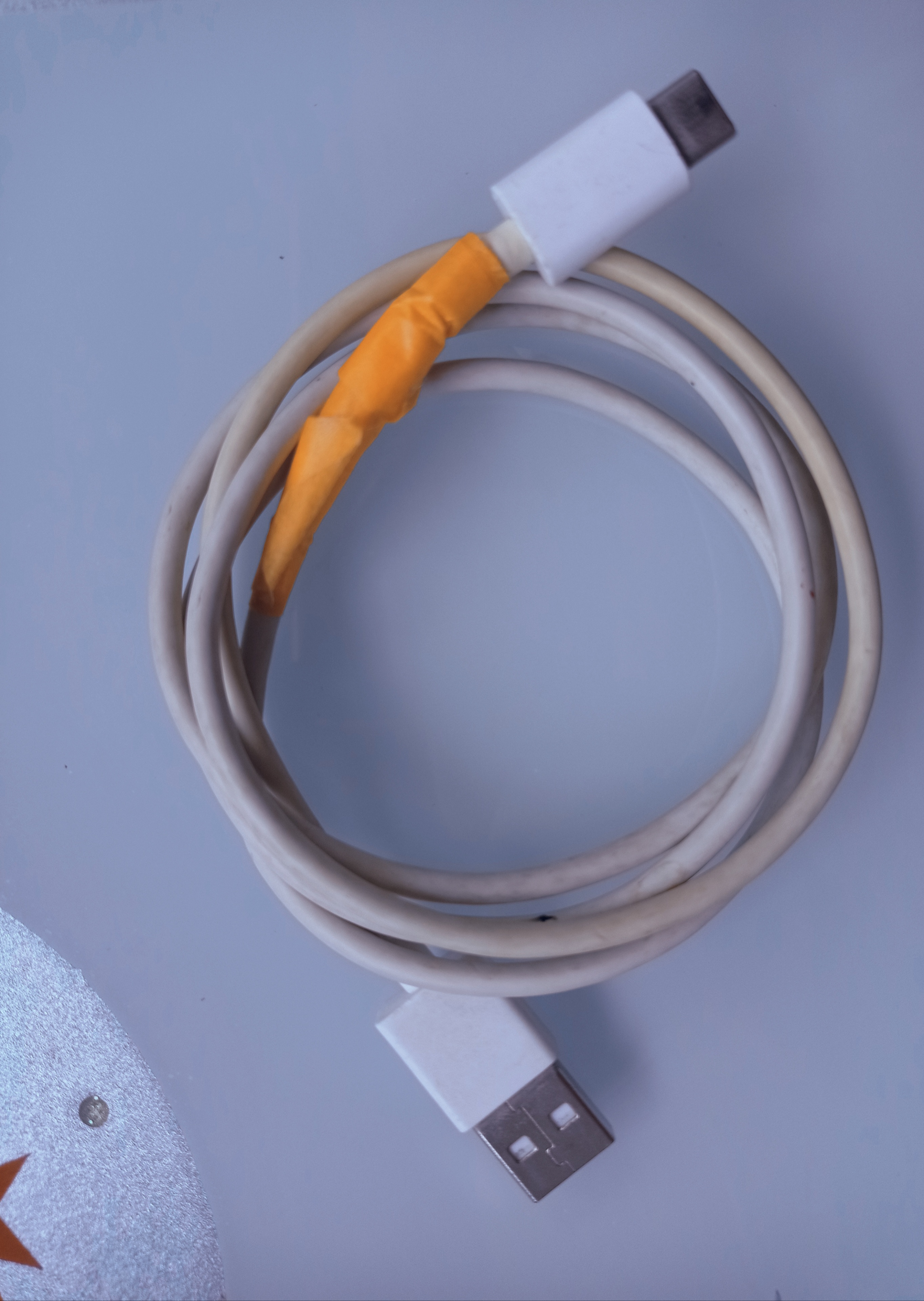 A broken charging cable iNEWS