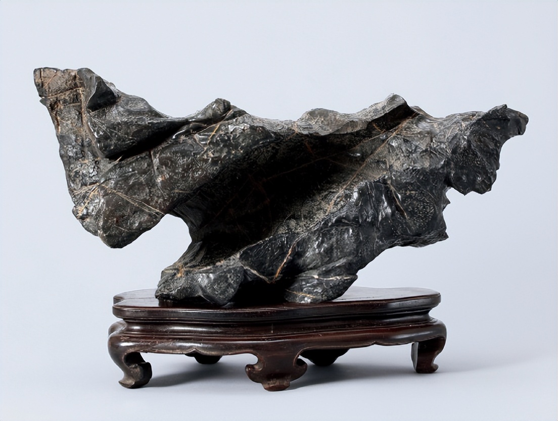 What is the stone that was written by Emperor Qianlong as "the best