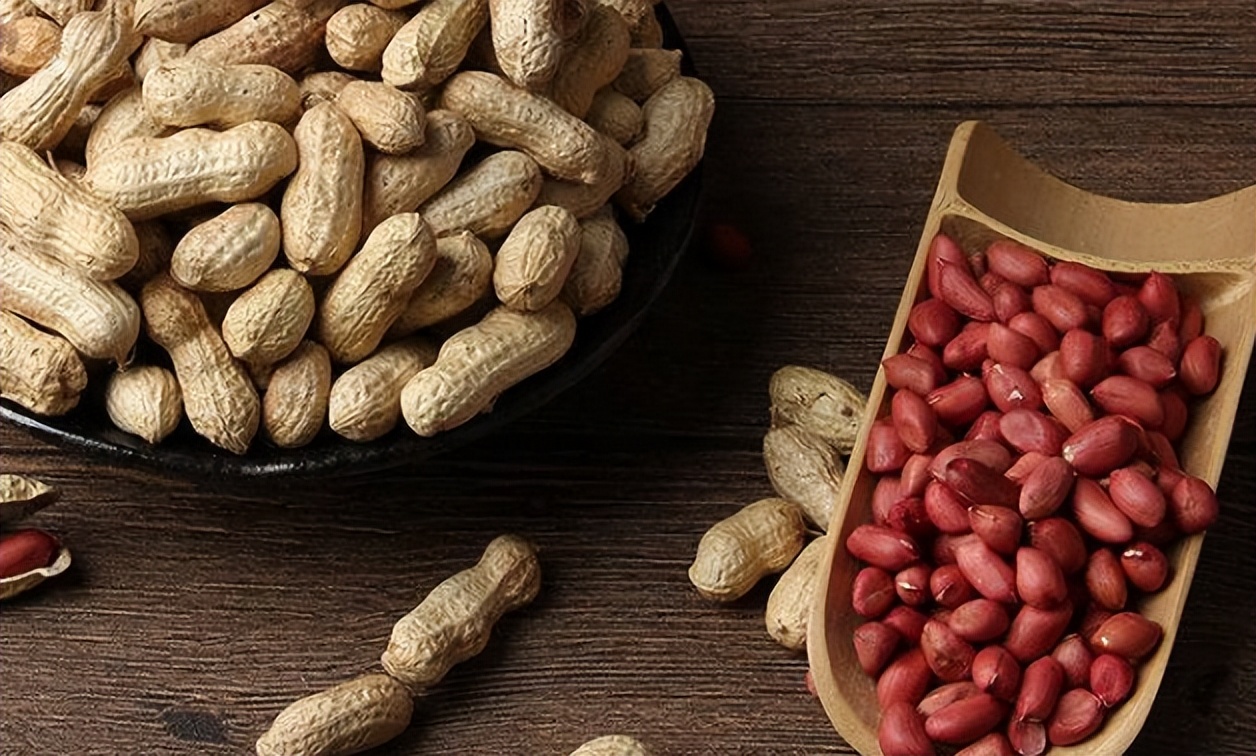 Does eating peanuts for a long time raise or lower blood pressure