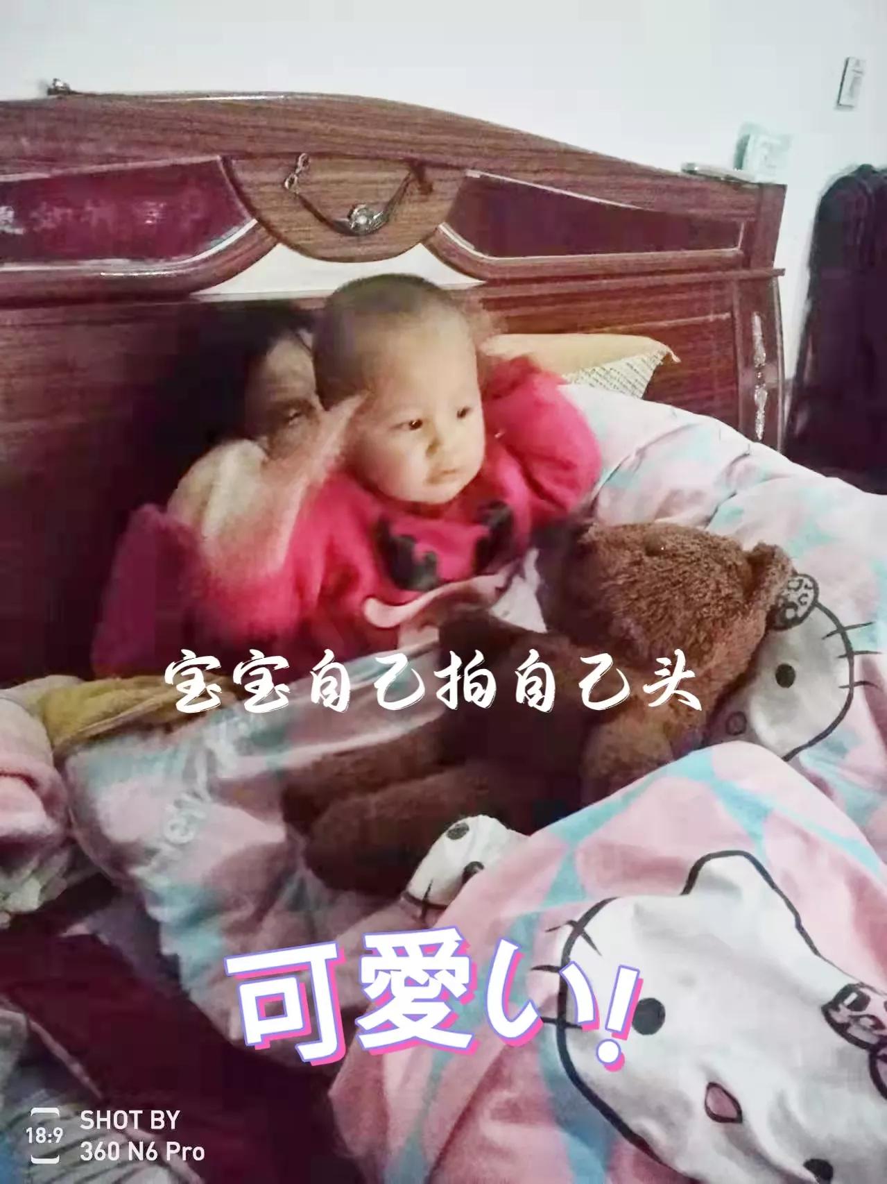 Why is the baby hitting himself on the head? iNEWS