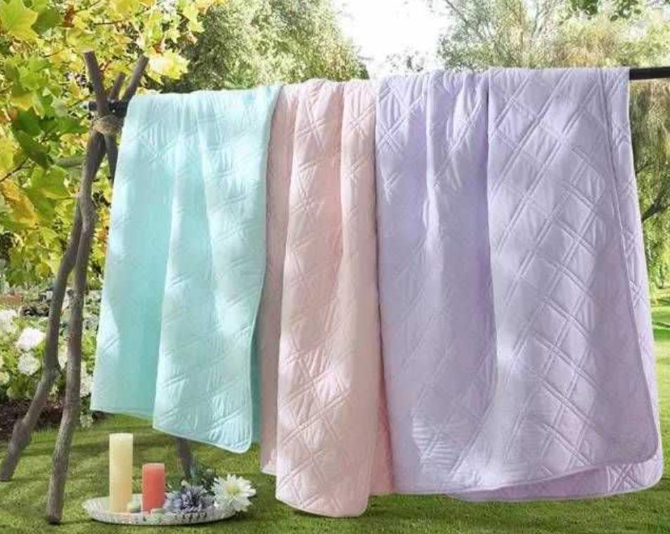 The "sun smell" after drying the quilt is actually the smell of mites