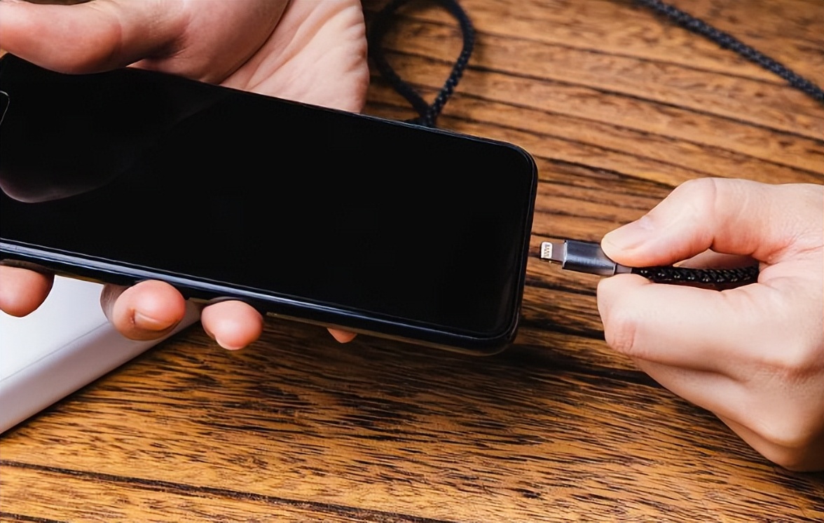 When charging, should you plug in the phone or the charger first