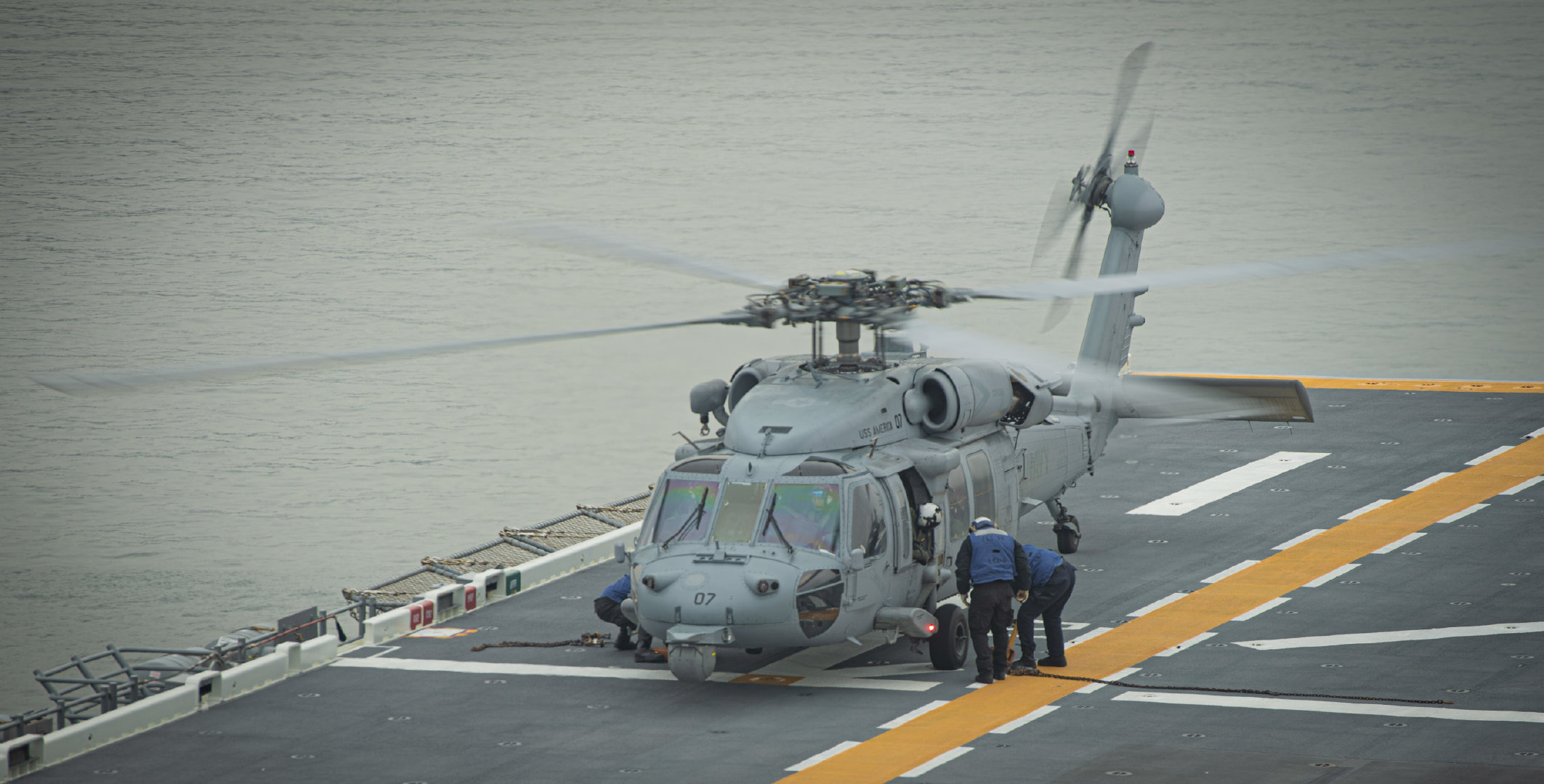 (HSC) Squadron 6 on the flight deck of the forward-deployed USS America ...