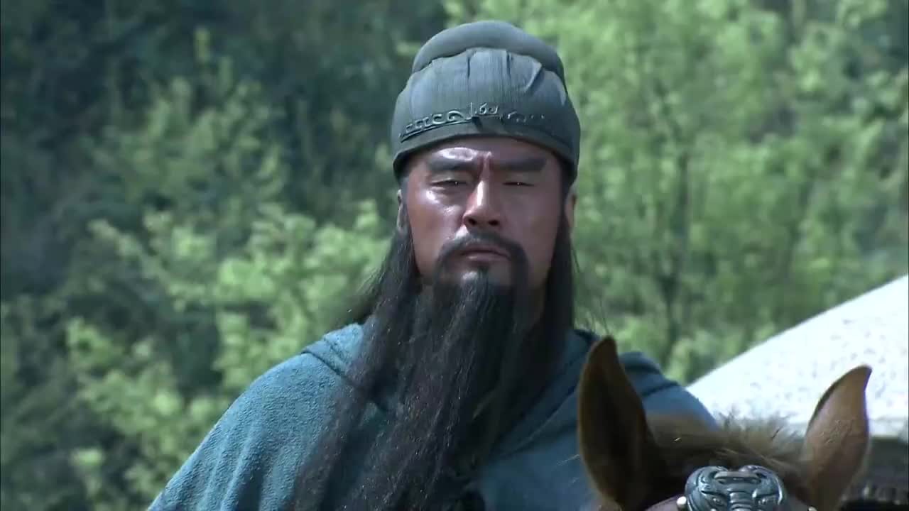 How tall is Guan Yu, who is 