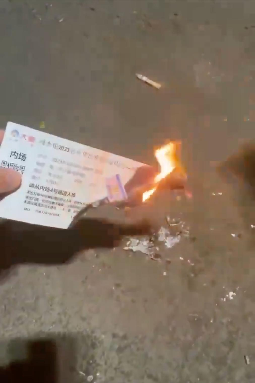 Highpriced tickets smashed into the hands, scalpers angrily burned the tickets, provoking while