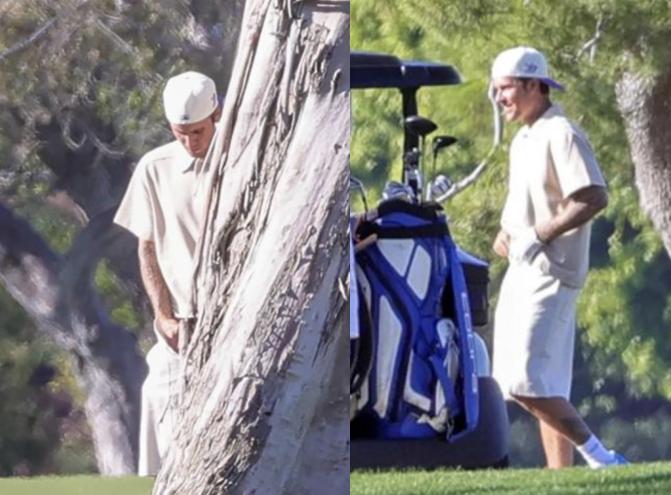 Justin Bieber was filmed peeing under a tree!Bowing his head to unzip ...