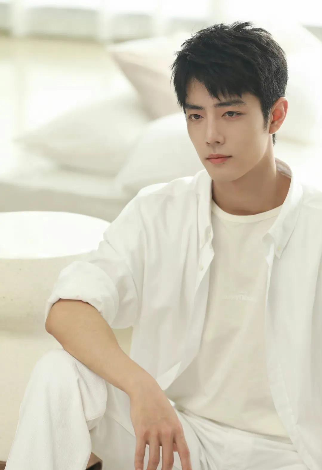 Xiao Zhan DAYTOY appeared in a white shirt in the latest behind-the ...