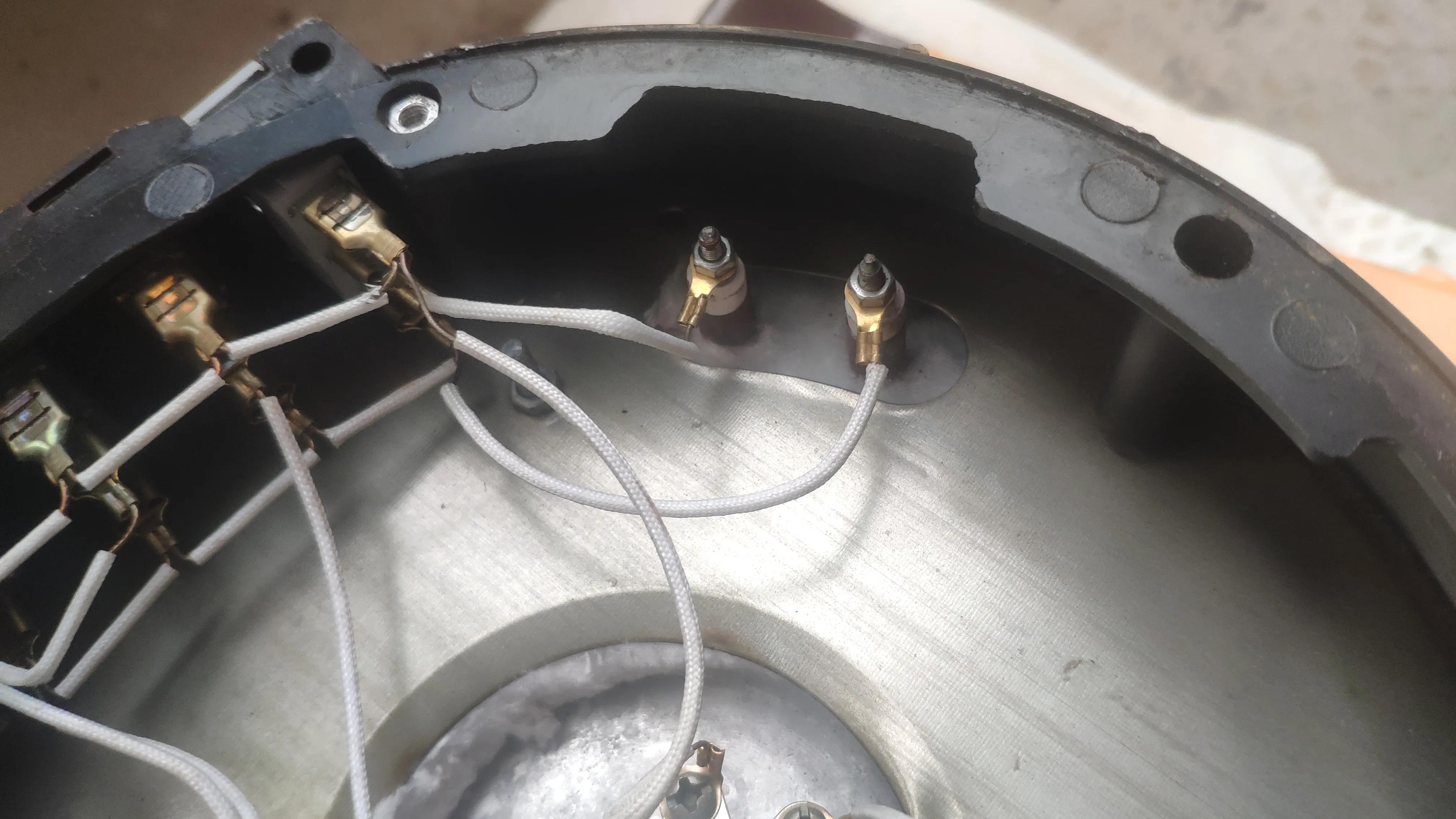 How to remove the base of the integrated electric cooker, and how to