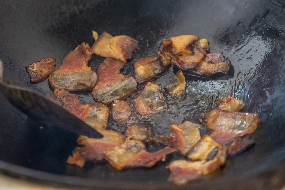 The fried bacon is harder than a stone. It can't be put into the pot