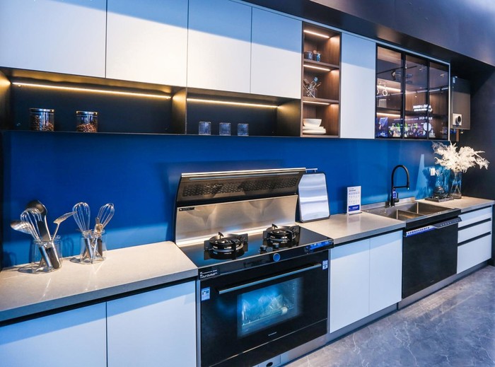 A happy kitchen built with an integrated stove and dishwasher, the