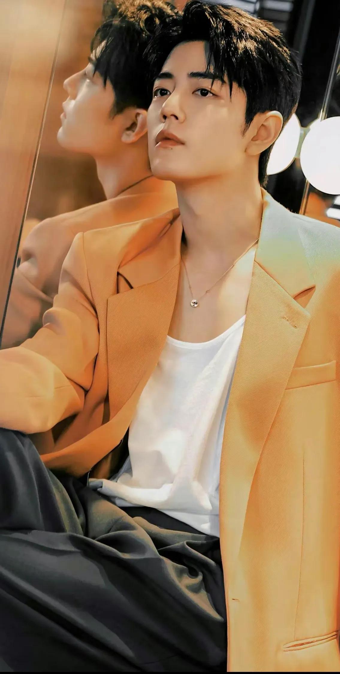 Xiao Zhan's orange suit looks so good! - iMedia