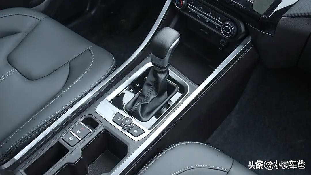 What is the difference between the handbrake and the P gear, and what