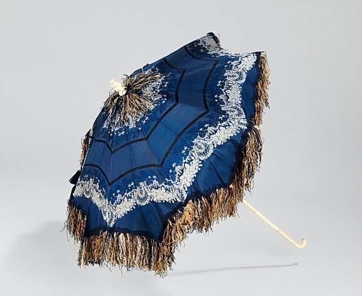 Explore the use and symbolic meaning of umbrellas in the European