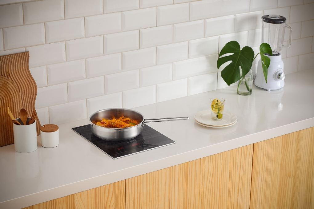 What are the advantages and disadvantages of builtin induction hobs