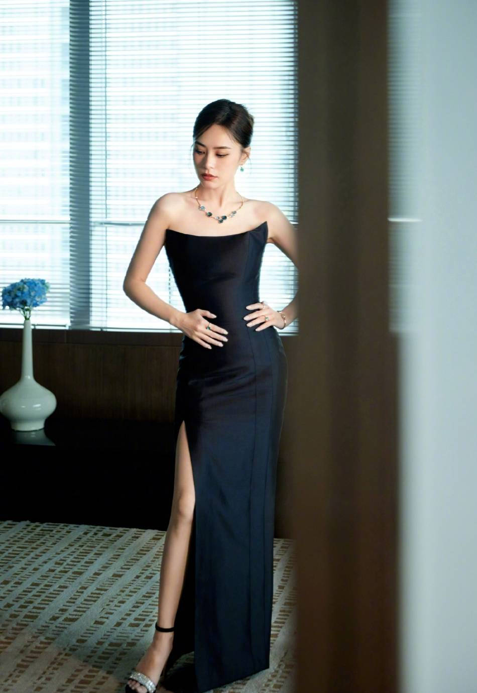 Gillian Chung wears a tube top dress with high slits to show her ...