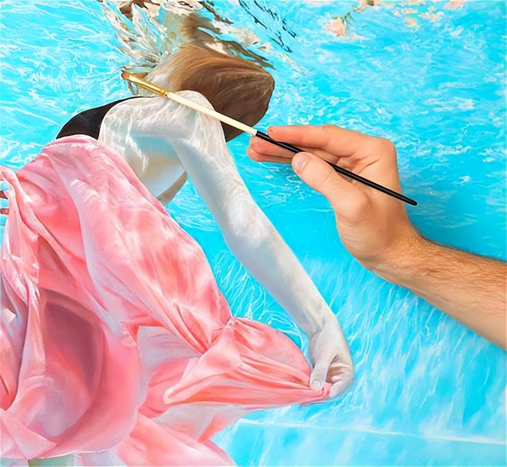 The body painting in the water, the dress is wrapped around the body